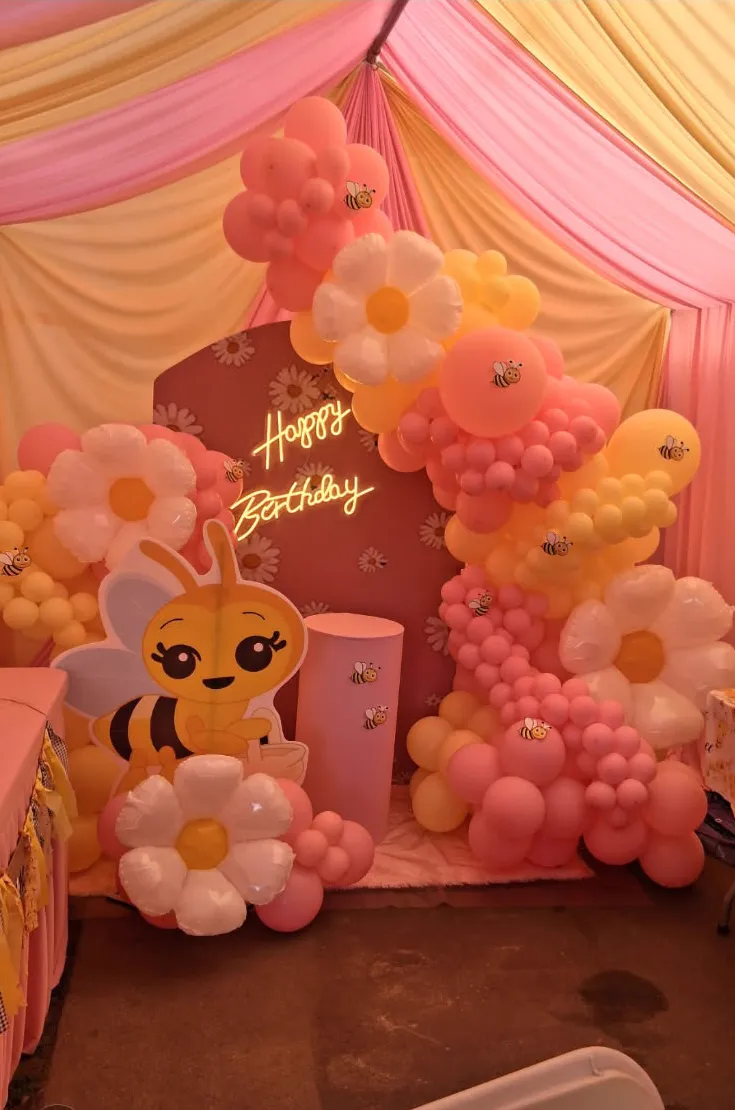 Bee themed balloon decoration