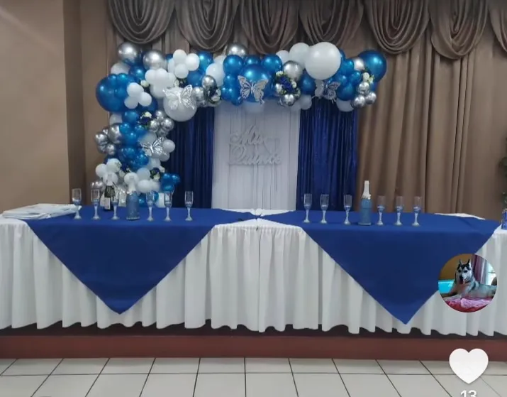 White and blue balloon decoration with table
