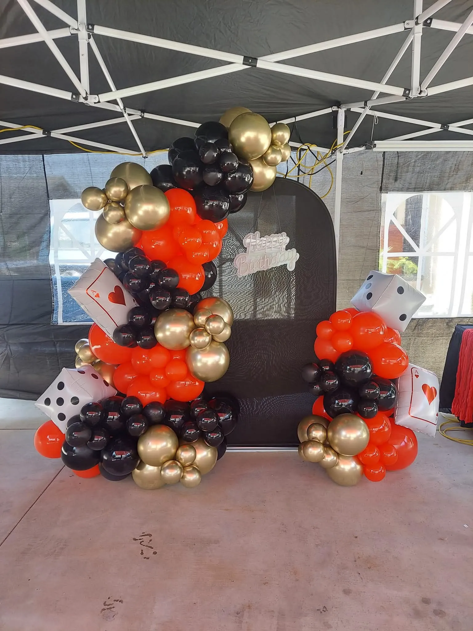 Playing card themed balloon backdrop